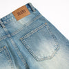 Washed Distressed Barrel-Leg Jeans