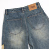 Vintage Ripped Barrel-Leg Jeans