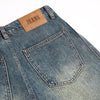 Vintage Ripped Barrel-Leg Jeans