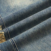 Vintage Ripped Barrel-Leg Jeans